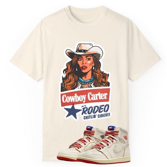 Comfort Colors T-shirt featuring an illustrated Beyoncé as Cowboy Carter in a star-studded cowboy hat, designed to match the Jordan 1 Retro Rare Air Cinnabar and Sail sneakers with rodeo and western-style tones.