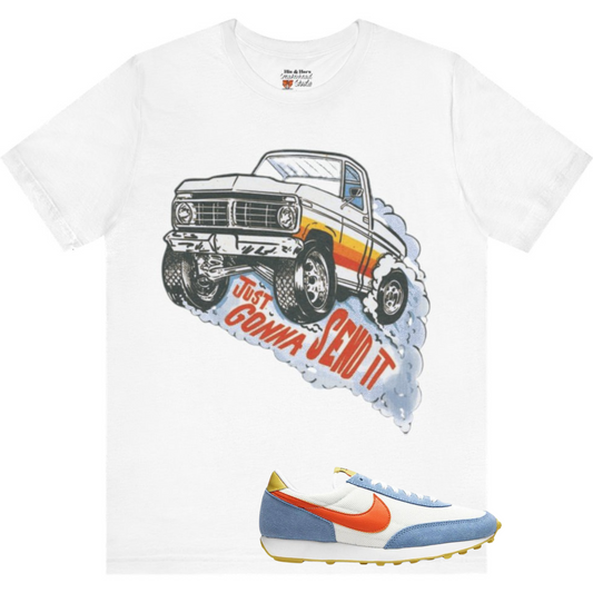 Retro monster truck burnout tee in orange and university blue. Lightweight Bella Canvas graphic shirt perfectly matched for Nike Daybreak sneakers.
